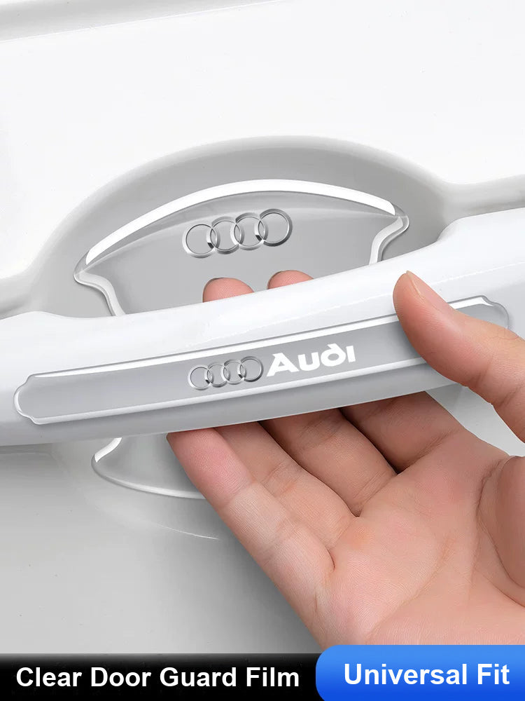 Audi logo door handle guard film fitted on a white car door