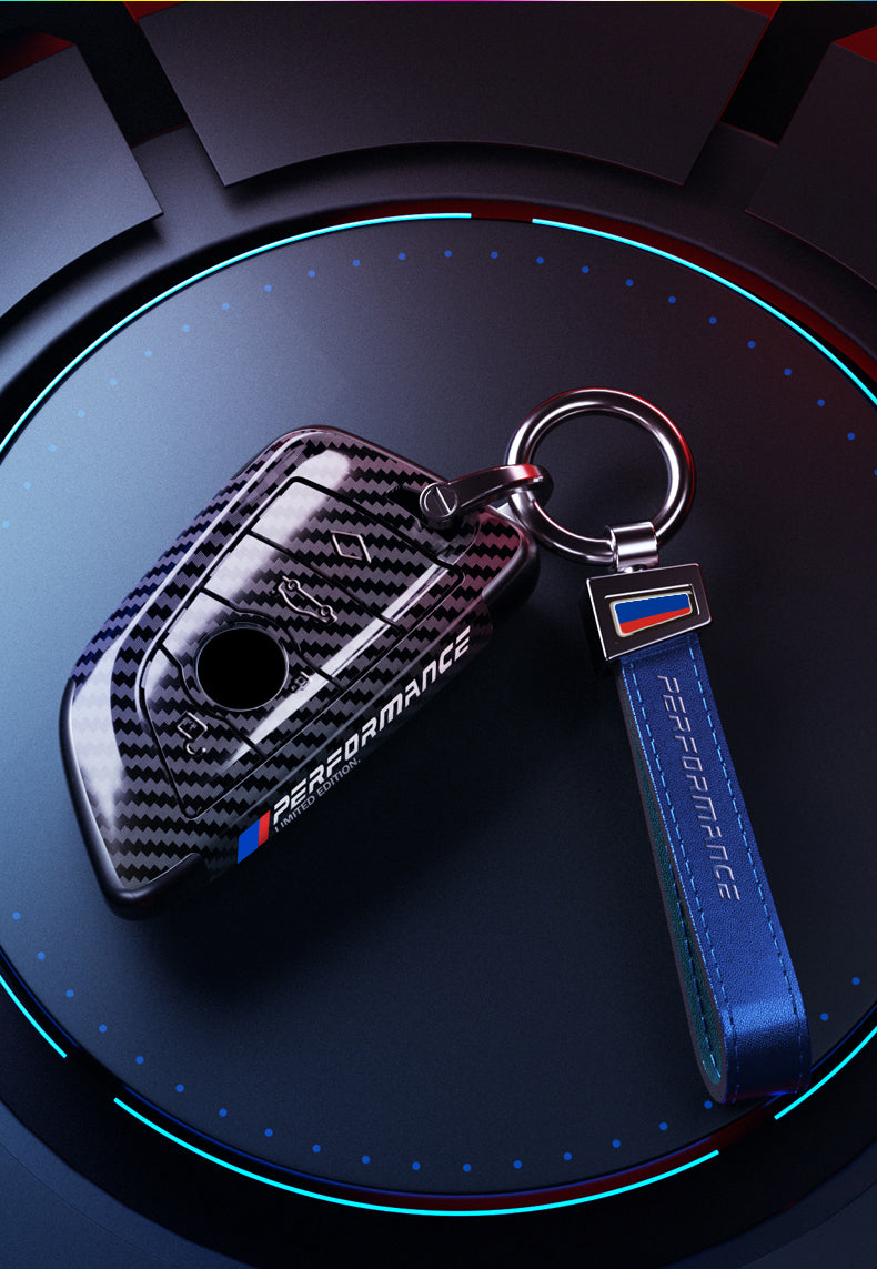 BMW carbon fiber key cover with blue leather strap keychain
