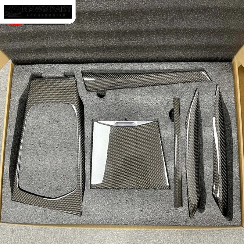 BMW M3 M4 carbon fiber interior trim pieces arranged in packaging