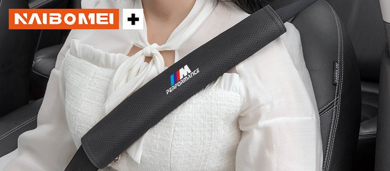 BMW seat belt shoulder pad worn by driver, front seat, close-up