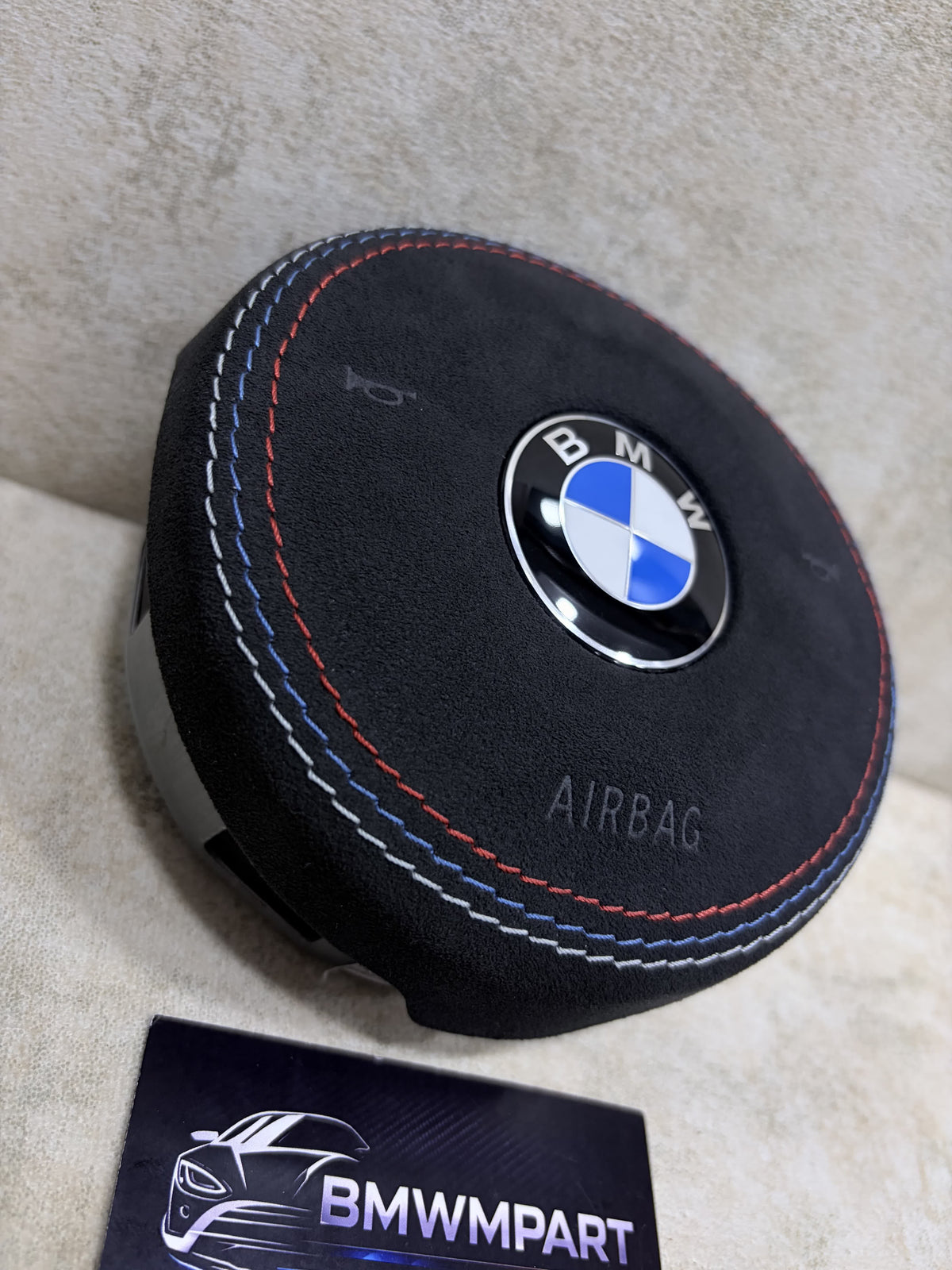 BMW F-Series Alcantara OEM Airbag M-Color Stitching - angled view