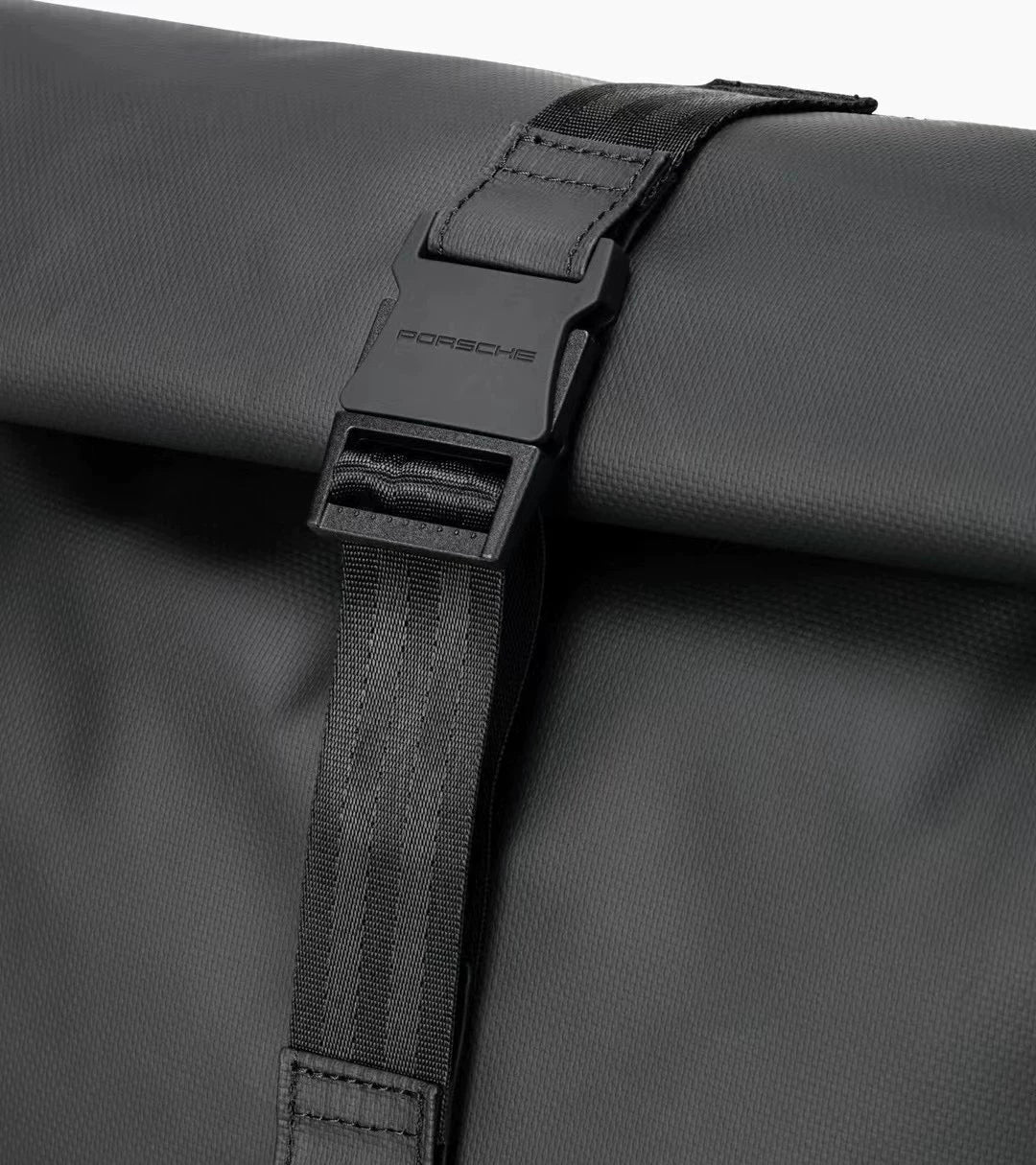 Porsche roll-top buckle and seat-belt style webbing strap detail