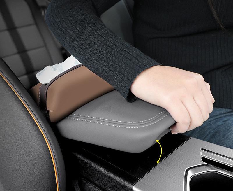 BMW leather tissue holder attached to center armrest without blocking access