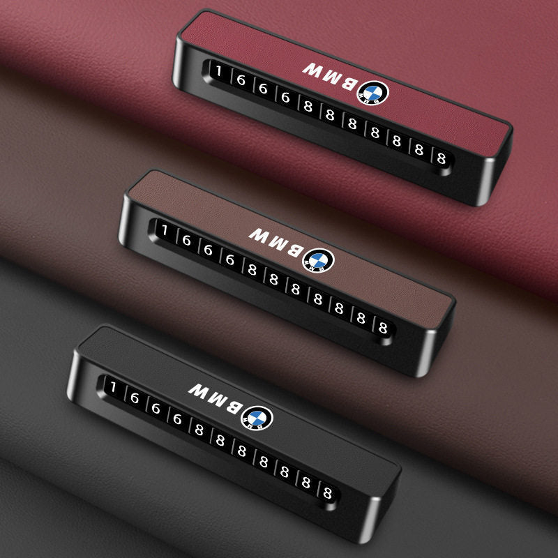 BMW parking plate color comparison showing red, brown and black variants