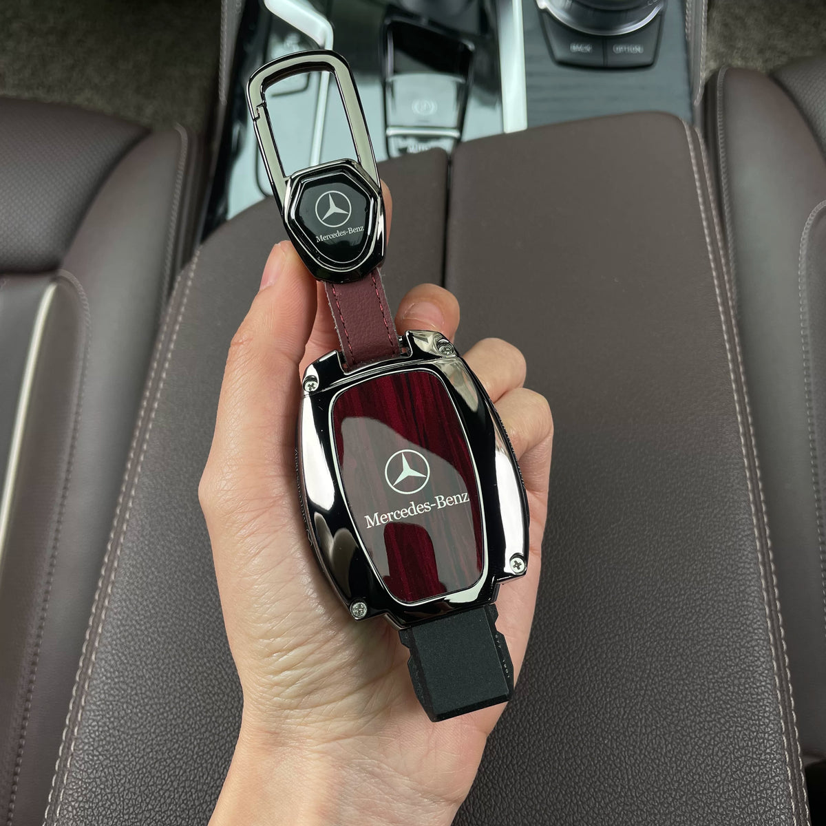 Redwood grain Mercedes-Benz key case with leather tab carabiner