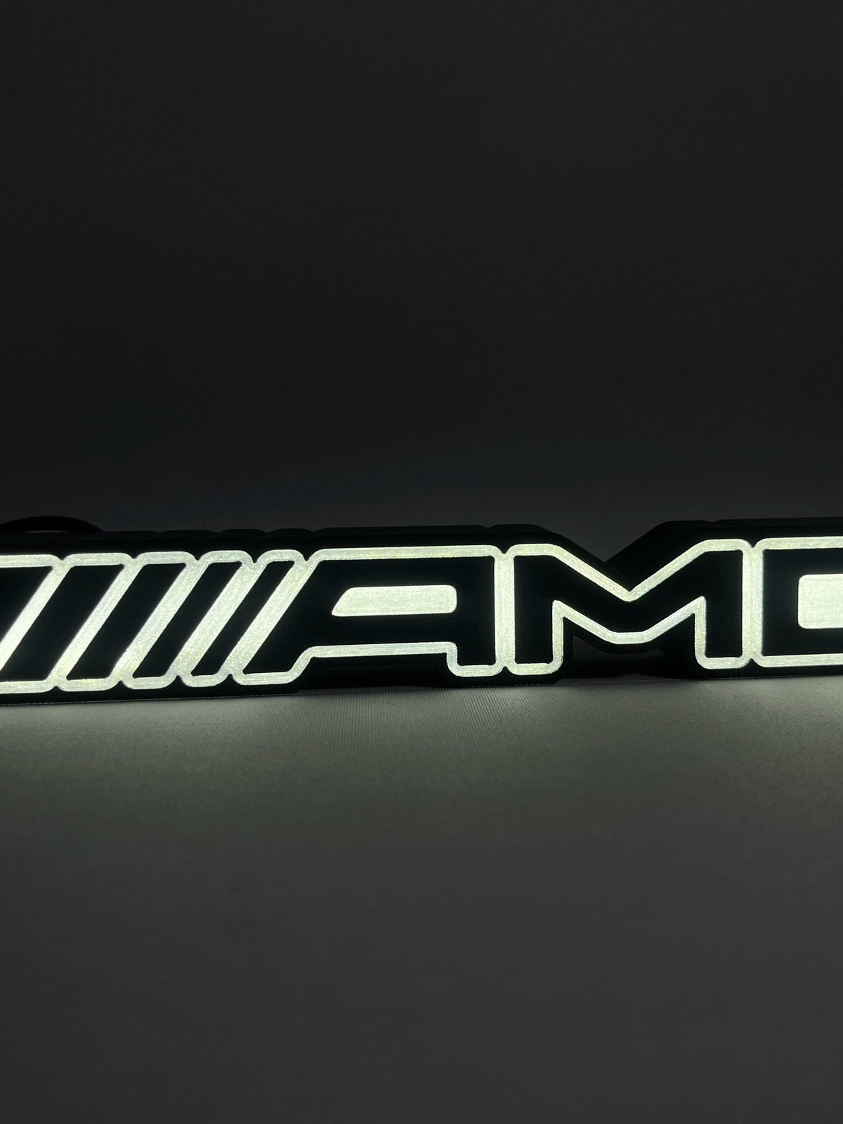 Mercedes-AMG illuminated emblem LED lamp glowing white