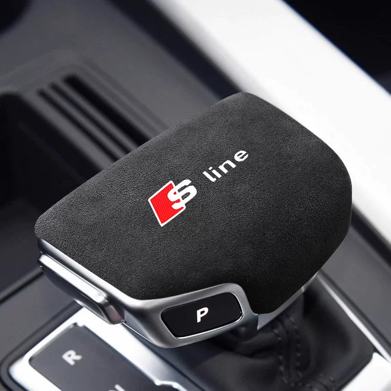 Audi suede gear knob cover with red S line logo fitted on the gear selector
