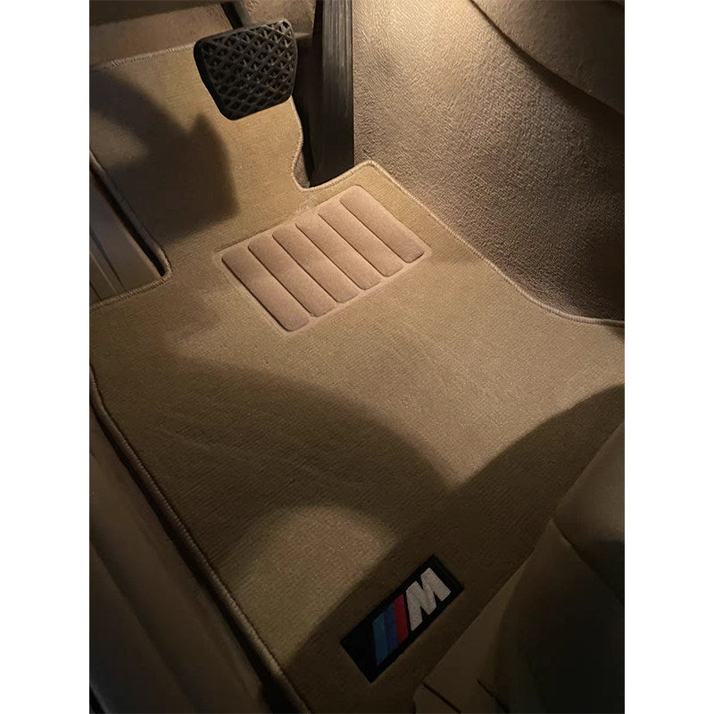 BMW beige velvet driver's floor mat with M performance badge