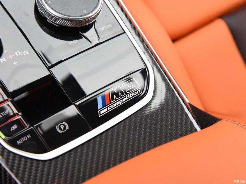 BMW M3 Competition center console badge sticker installed in car interior