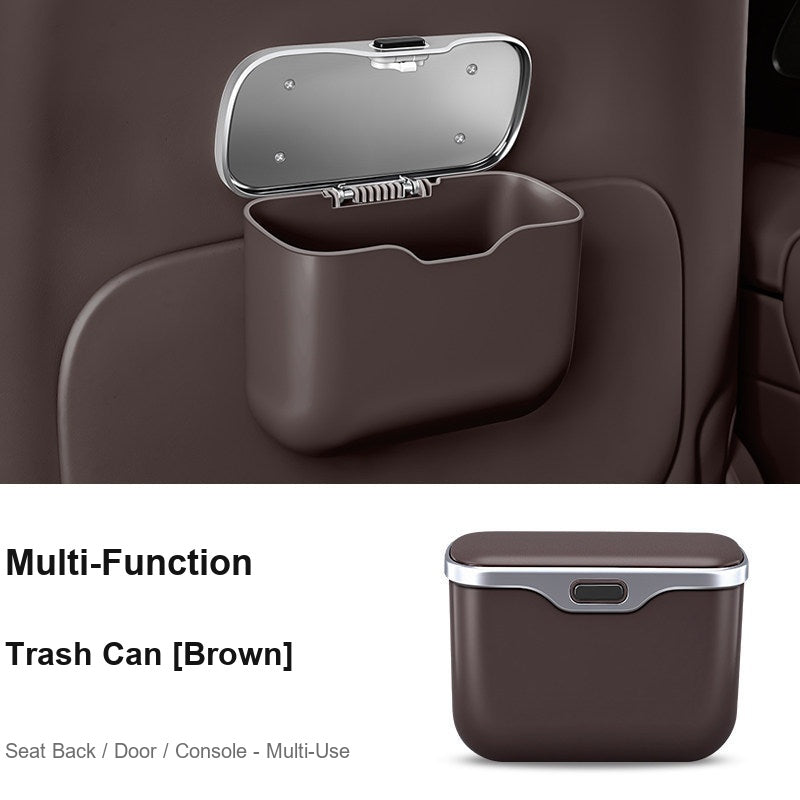 Multi-function BMW car trash bin brown, mounted on seat back in car interior