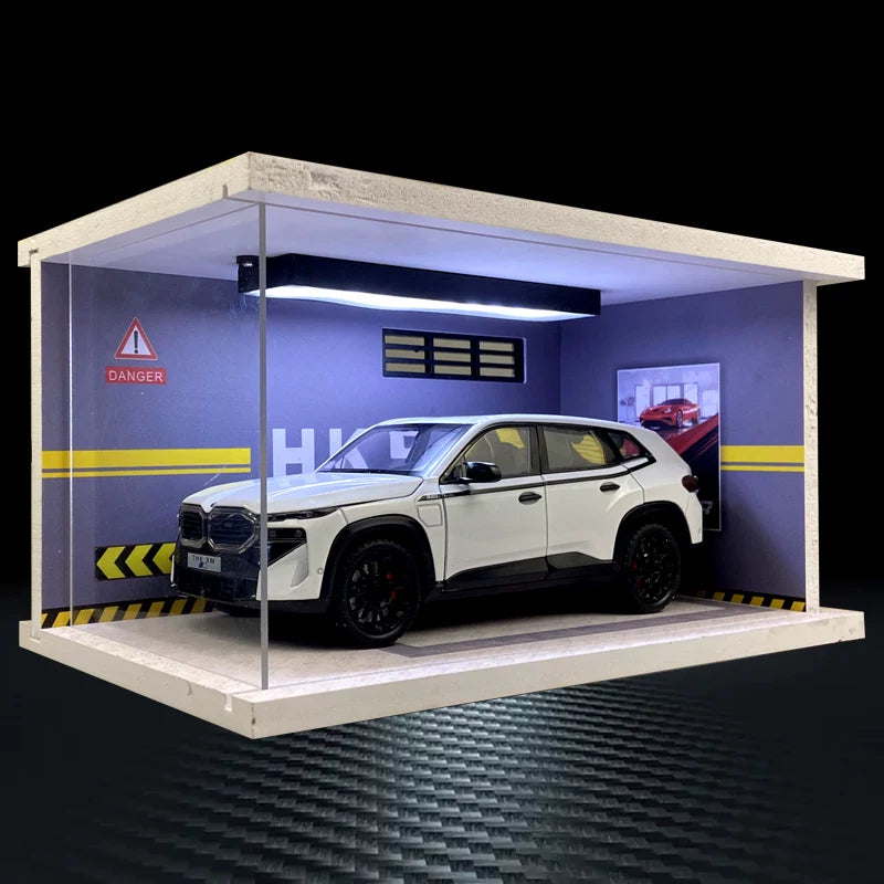 White 1:24 BMW XM diecast model – LED Luxury Garage B – Blue Workshop