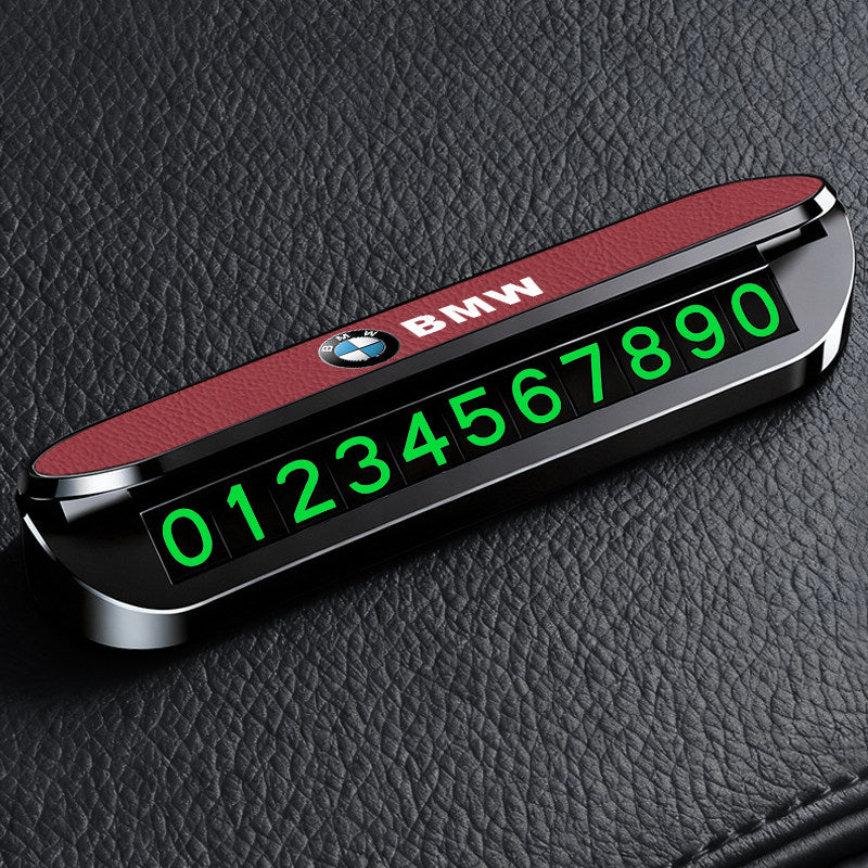 BMW LED parking number display close-up on black leather car seat