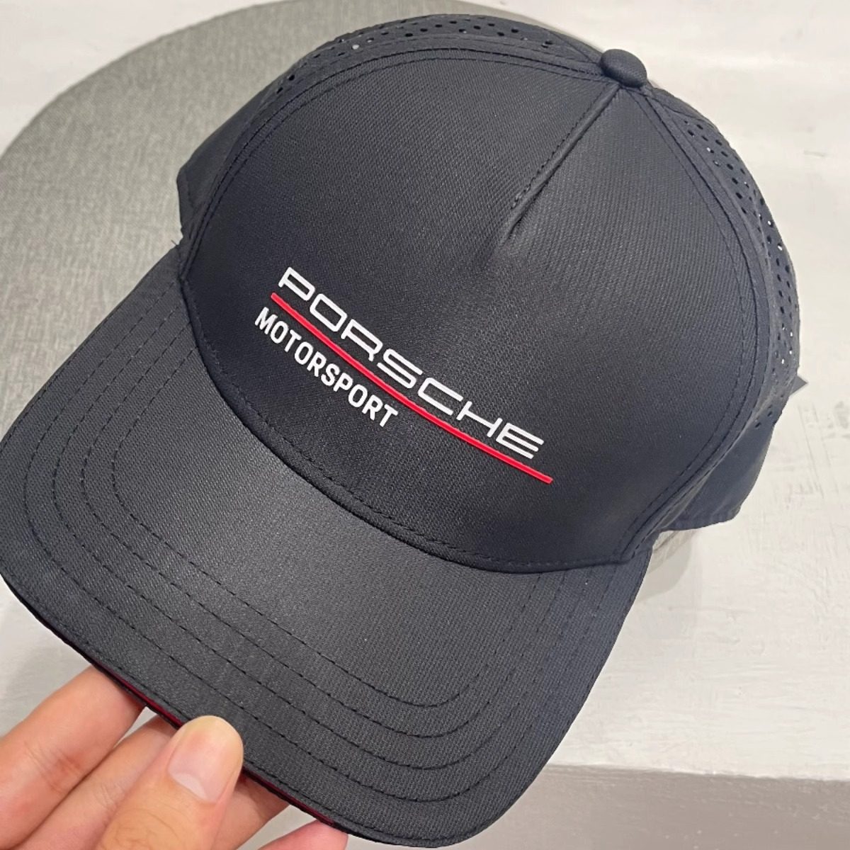 Porsche Motorsport cap in black, logo detail