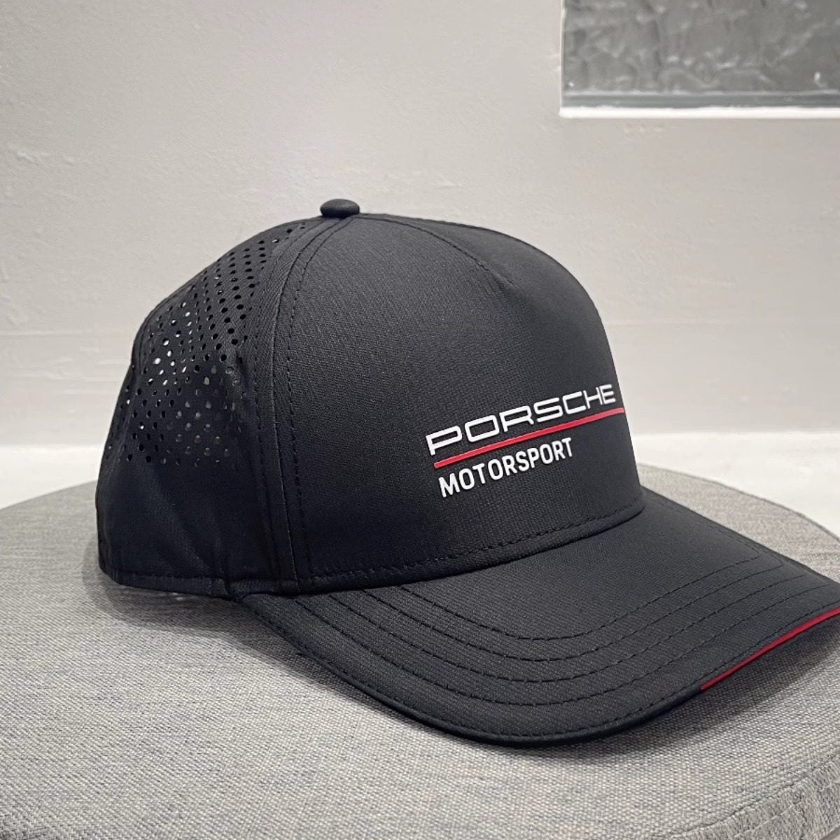 Porsche Motorsport cap in black with perforated side panels