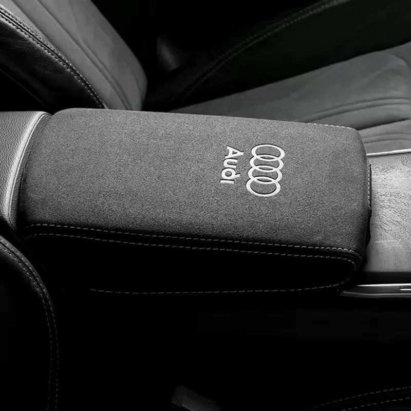 Audi suede armrest cover with embossed Audi rings logo