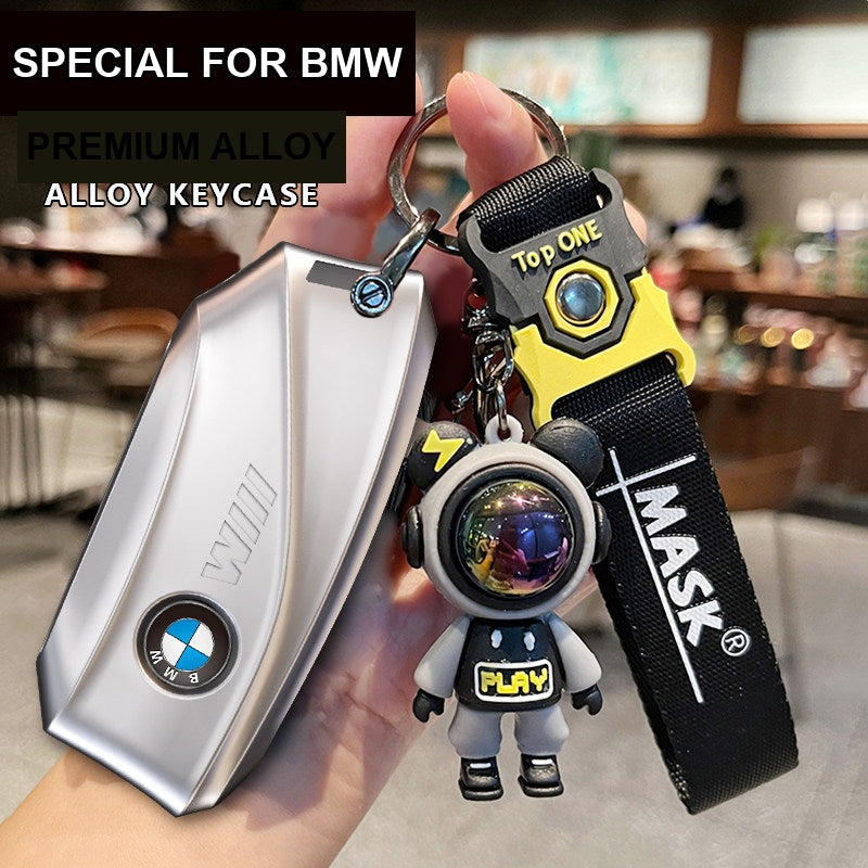 BMW key case silver with black astronaut charm keychain