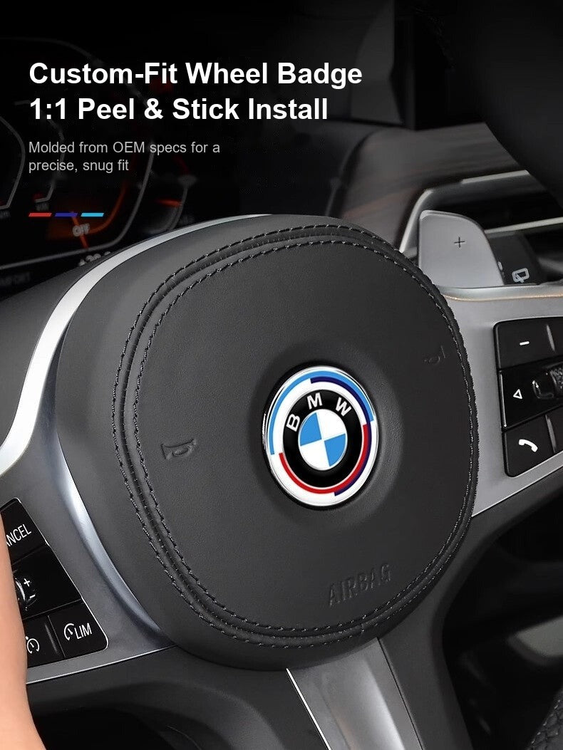BMW steering wheel badge 1:1 peel and stick install shown on wheel