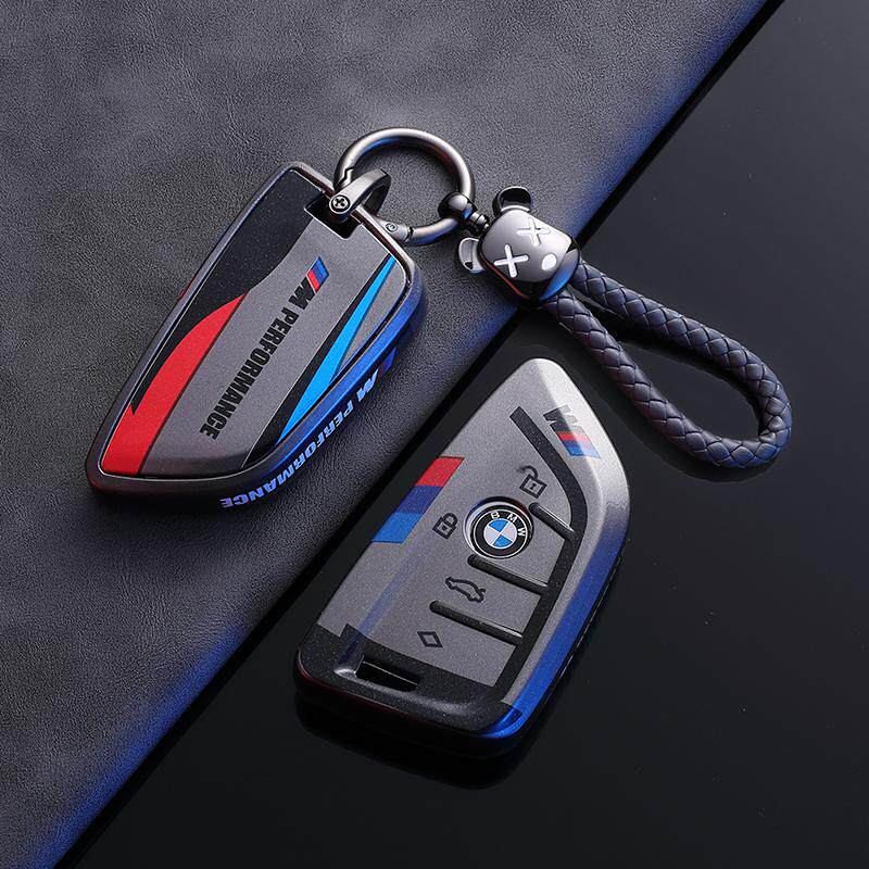 BMW Style B G-Series key fob case, black shell, woven rope strap keychain