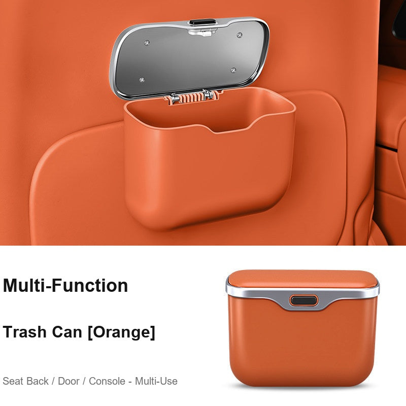 Multi-function BMW car trash bin orange, mounted on seat back in car interior