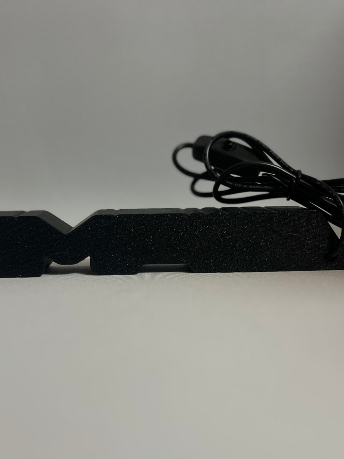 Mercedes-AMG emblem lamp side profile with USB power cable