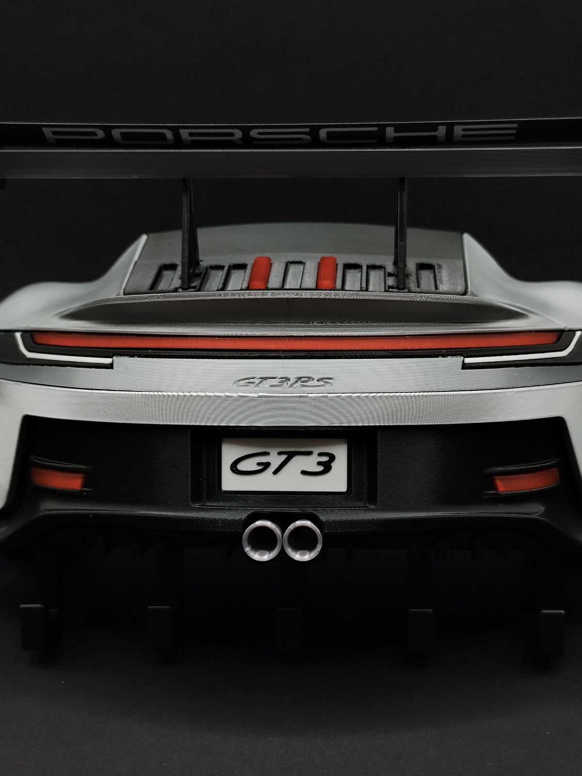 Porsche GT3 RS 3D rear model key holder on dark background