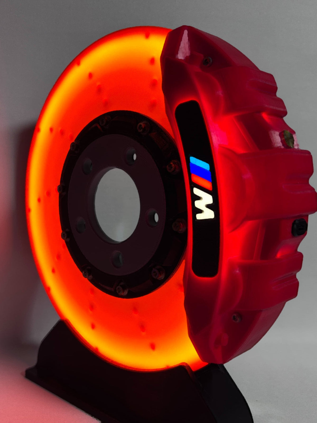 BMW M brake disc LED night light, red caliper, front view