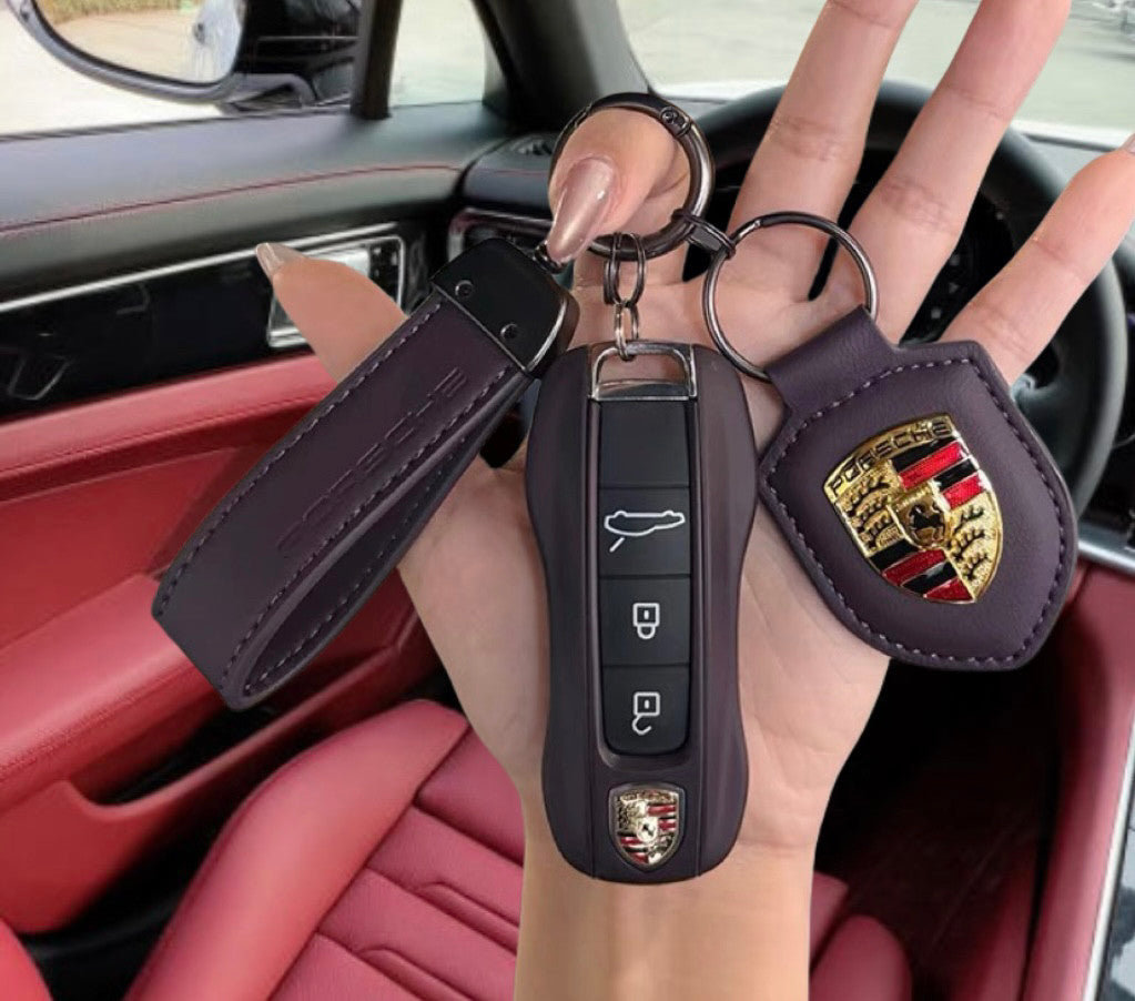 Porsche Key Case Set – Glossy Shell with Wrist Strap and Crest Keychain for Macan, Cayenne, Panamera, 911, Taycan and 718