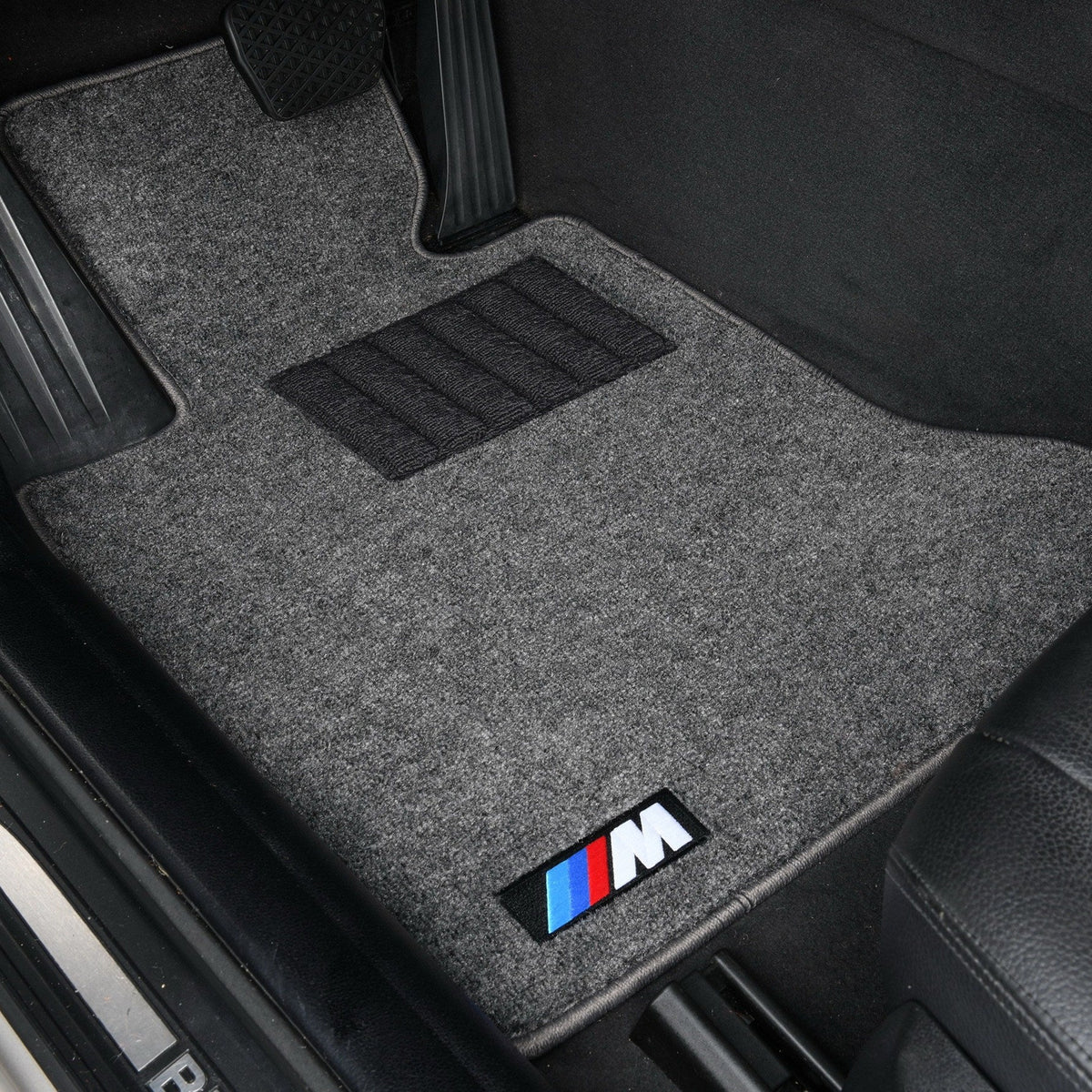 BMW light gray velvet driver's floor mat with M performance badge