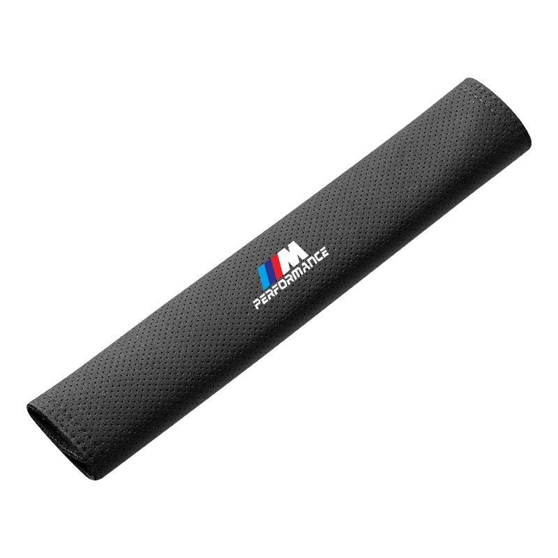 BMW M Performance seat belt shoulder pad, black leather, studio shot