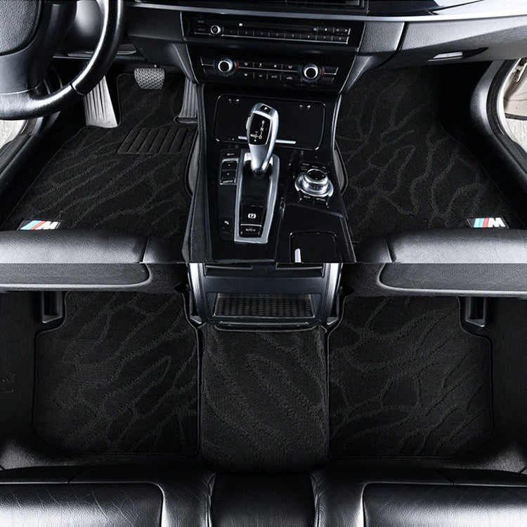 BMW black jacquard floor mat set with patterned weave design