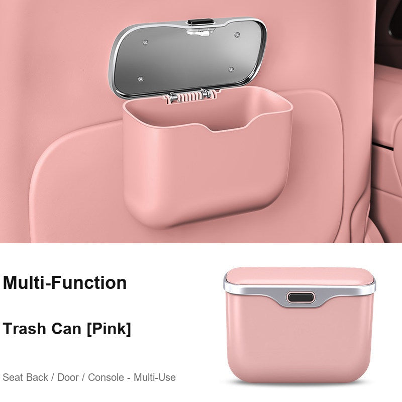 Multi-function BMW car trash bin pink, mounted on seat back in car interior