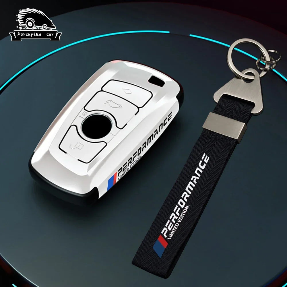 BMW white key case with leather keychain