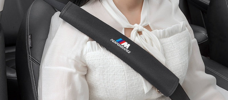 BMW seat belt shoulder pad worn by driver, front seat, alternate view