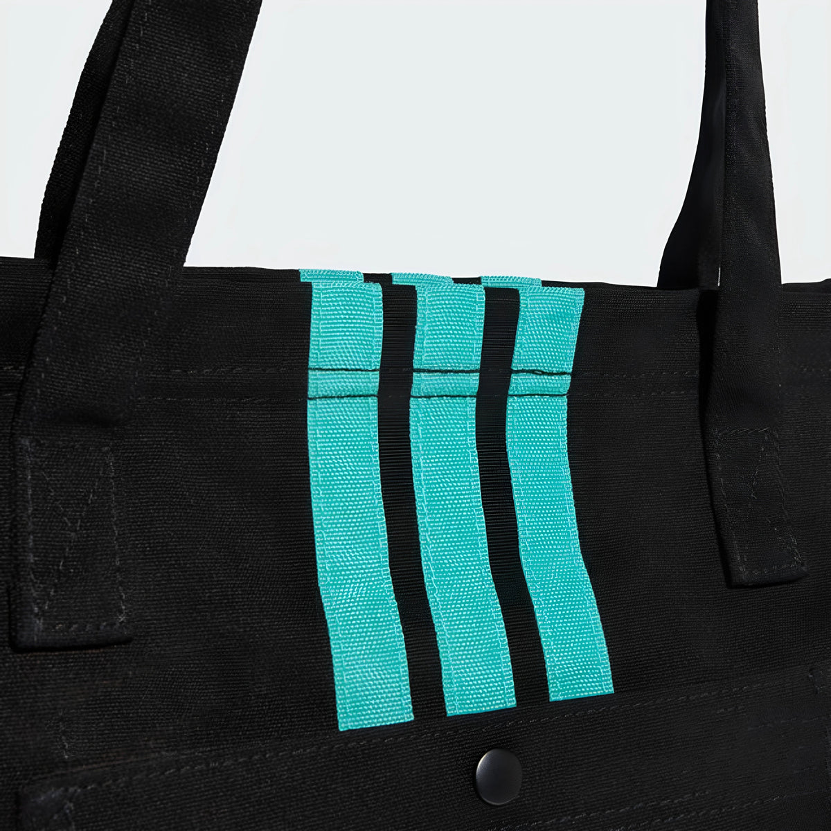 Mercedes-AMG Petronas F1 Team canvas tote bag – close-up of teal webbing stripes and handle stitching