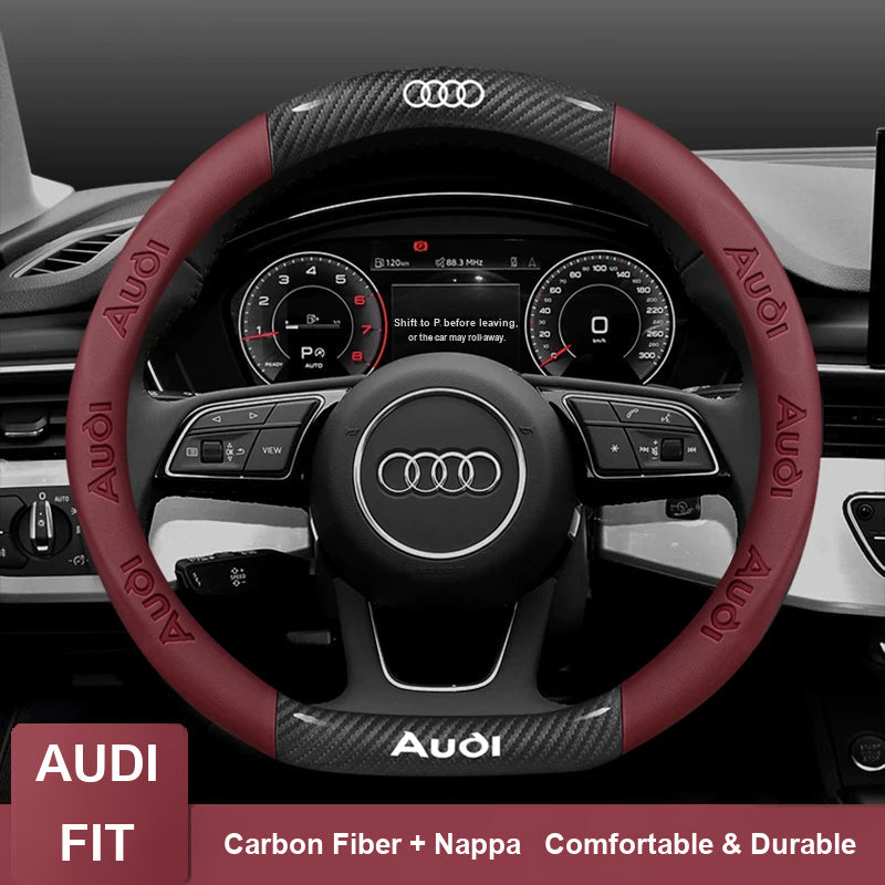 Audi carbon fiber and nappa steering wheel cover in wine red on an Audi interior