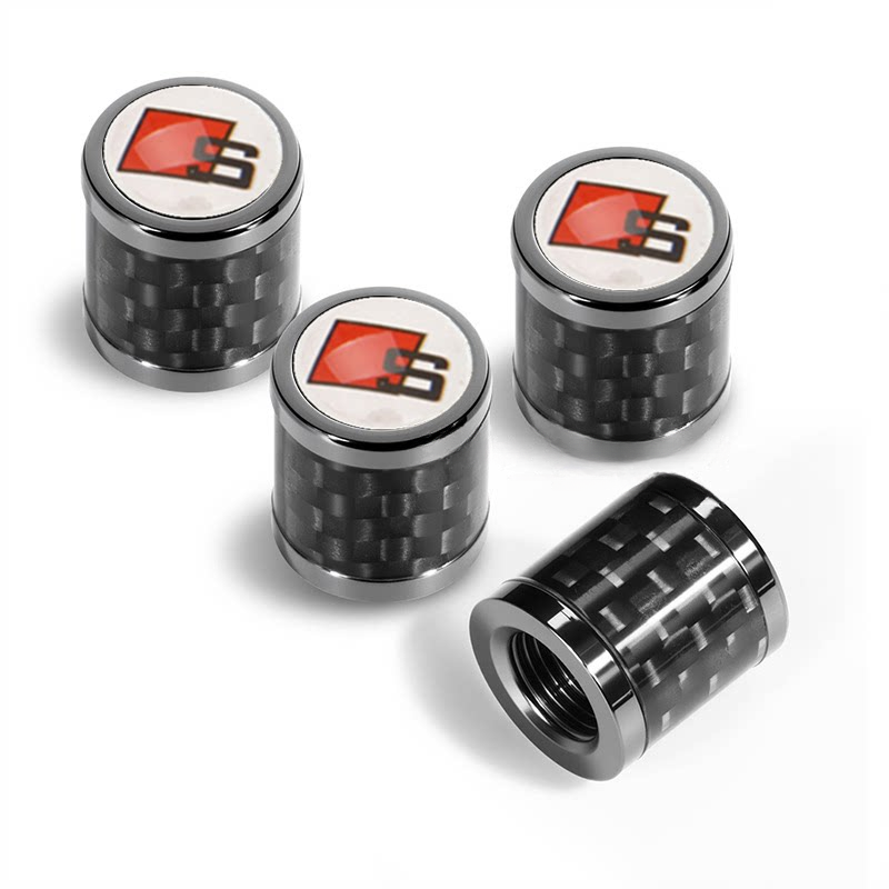 Audi carbon fiber valve caps with S badge on white
