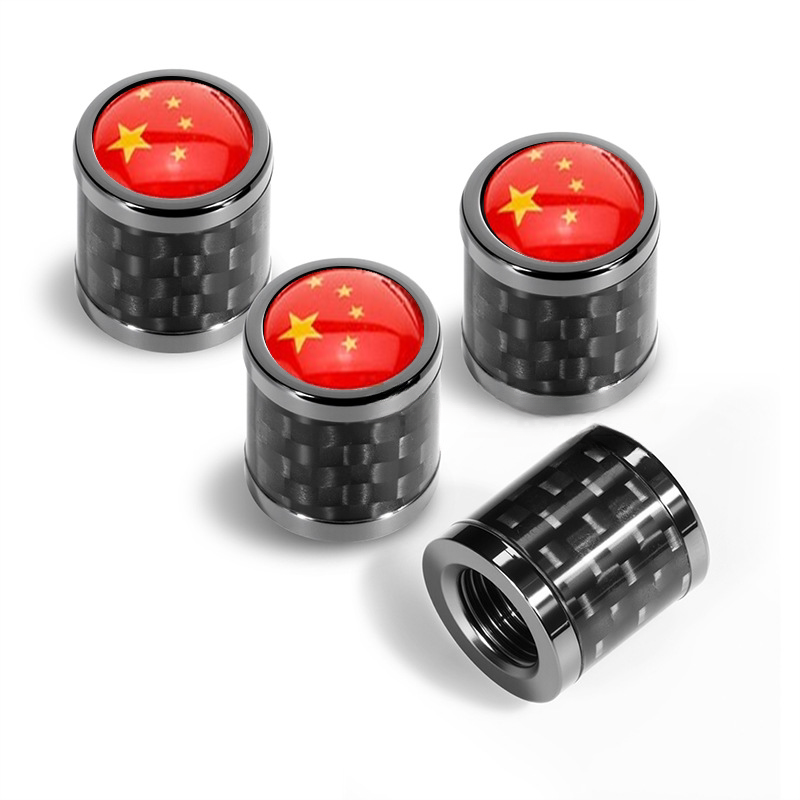 Carbon fiber valve caps with red star flag emblem