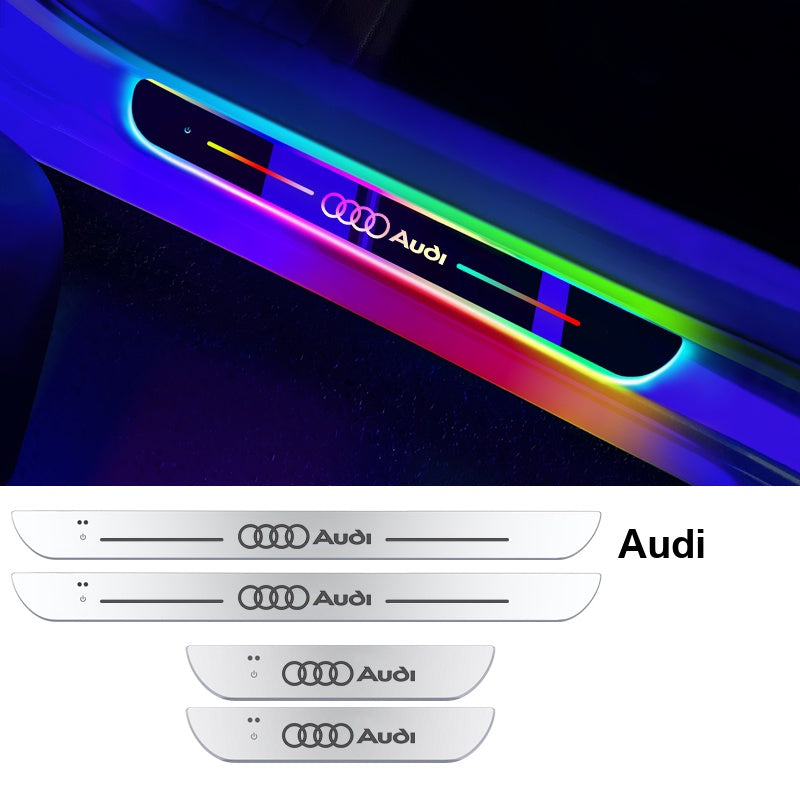 Audi illuminated LED door sill plate with rainbow welcome light