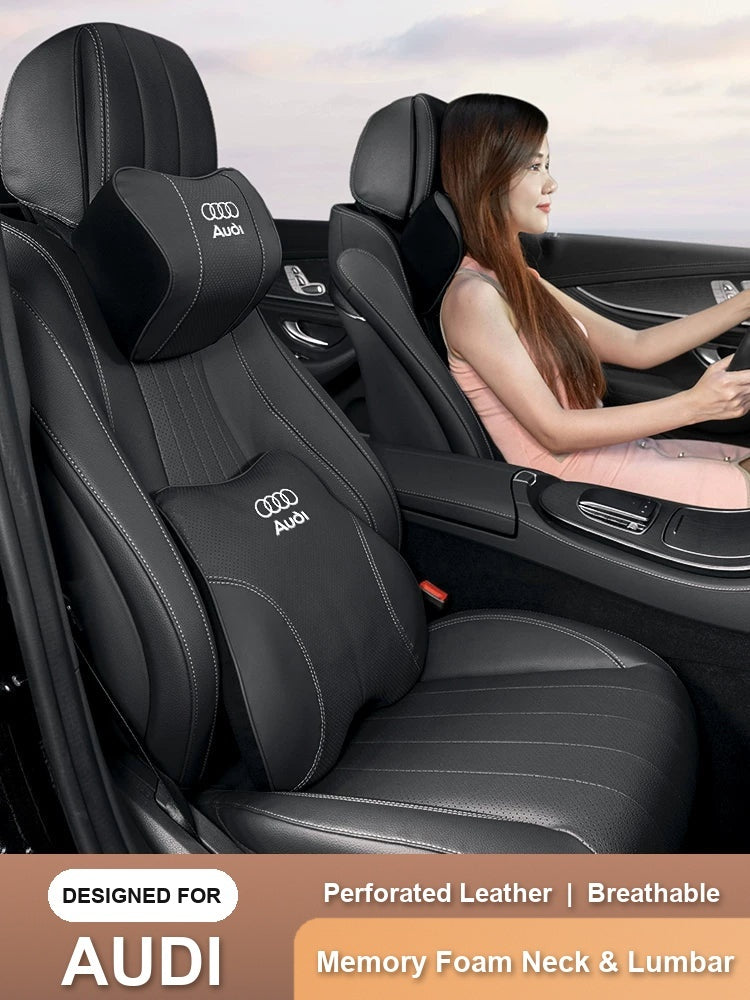 Audi perforated leather headrest and lumbar pillow in a car seat