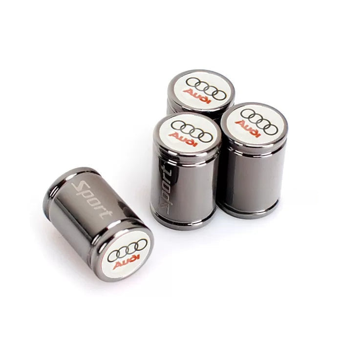 Audi Sport engraved valve caps – Titanium Black with white Audi emblem, set of 4