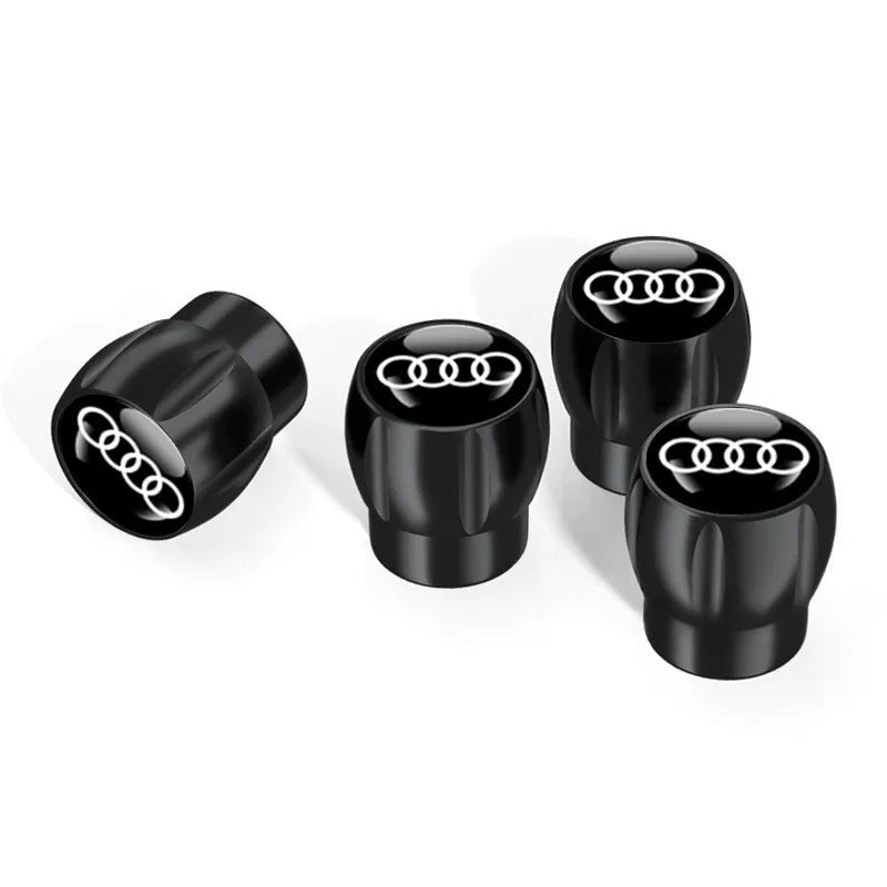 Audi Sport fluted alloy valve caps – Black with Four Rings Black Emblem