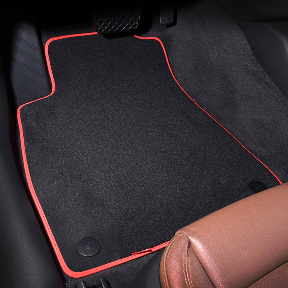 Audi velour floor mat with red edge trim fitted in the driver footwell