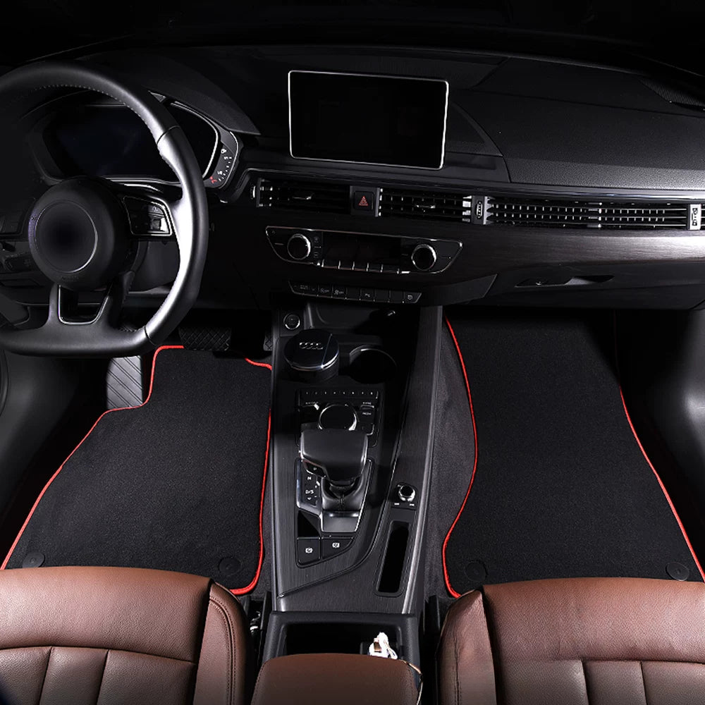 Audi velour floor mat set with red edge trim fitted in the front cabin