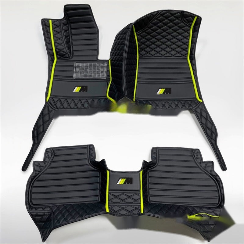 BMW custom leather floor mats, black with fluorescent green trim