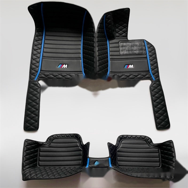 BMW custom leather floor mats, black with blue trim