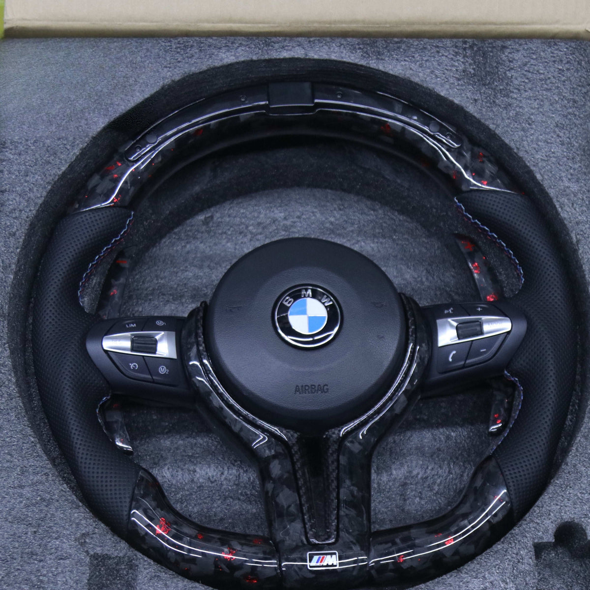 BMW F Series red forged carbon steering wheel, front view