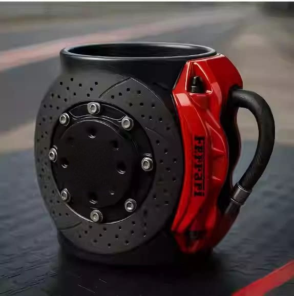 Brake caliper coffee mug with red caliper handle and drilled disc design
