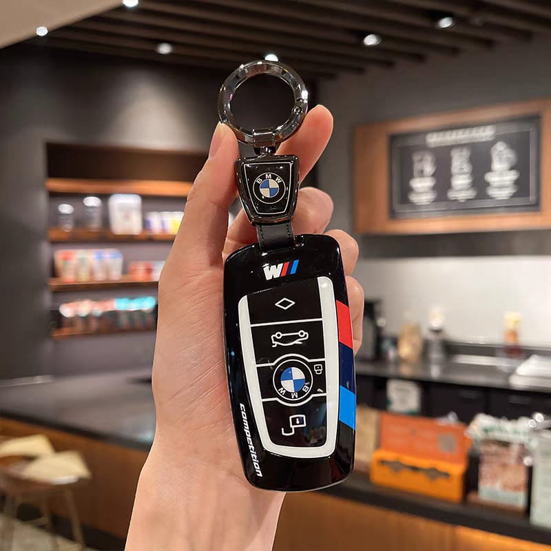 BMW F-Series key shell case, black, with BMW leather keychain