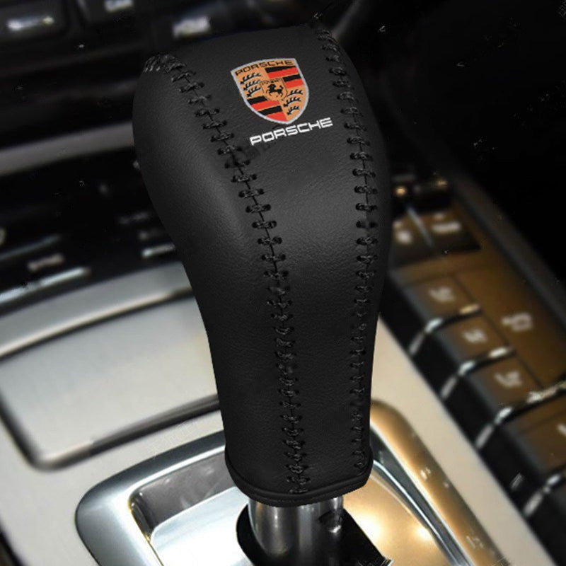 Porsche Cayenne gear shift cover in black with black stitching