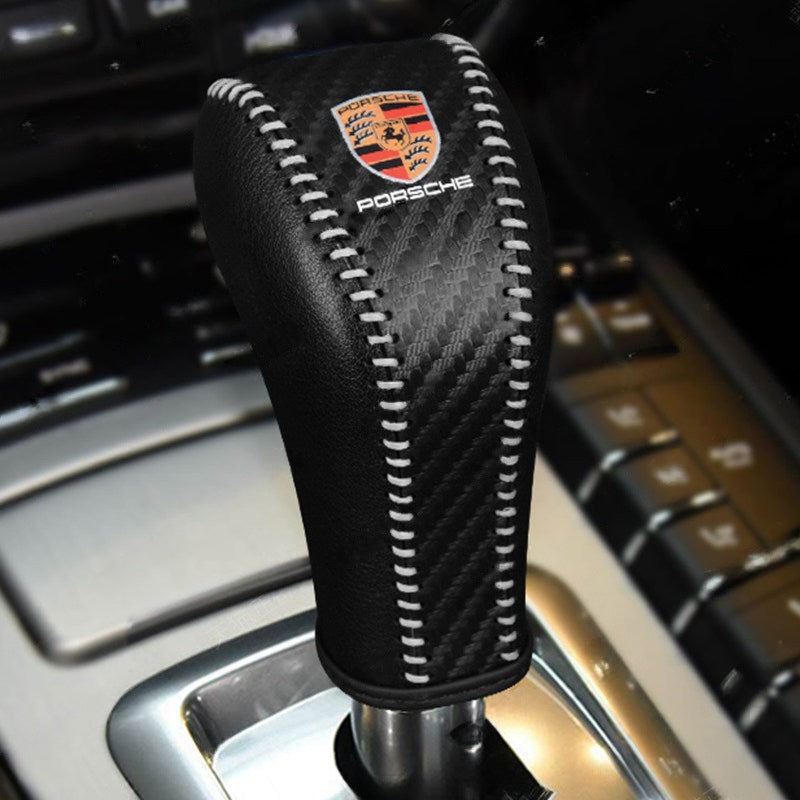 Porsche Cayenne gear shift cover in carbon fiber with contrast stitching
